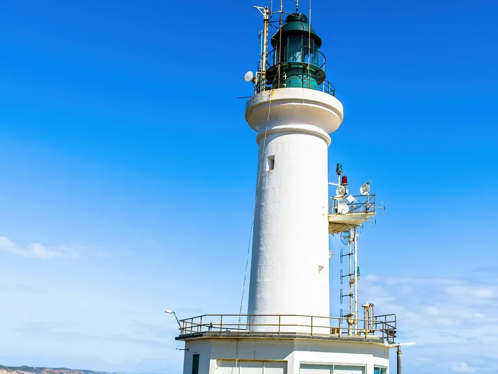 Point Lonsdale Lighthouse standing above the sea at the entrance to Port Phillip Bay
