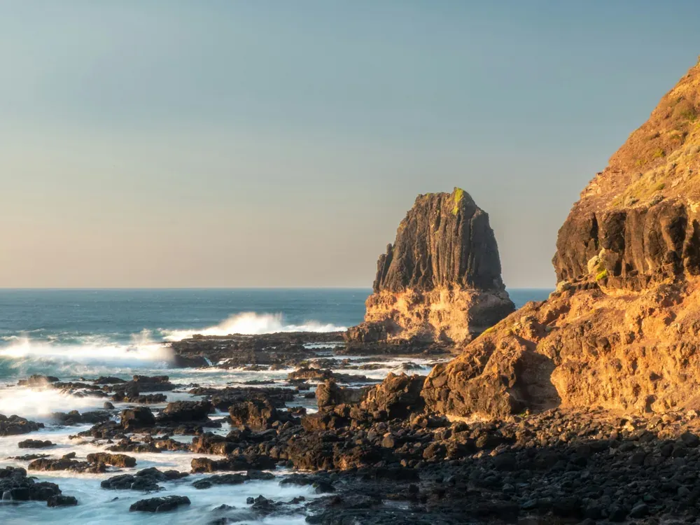 Pulpit Rock rising from the sea off the rock platform at Cape Schanck, on the Bass Strait side of the Mornington Peninsula